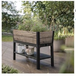 New Keter Signature Collection 29 Gal. Resin Elevated Garden Bed  Dimensions: 18.7" x 44.5" x 31.4" Weight: 27.8 lbs Inside Dimensions: 17.9" x 43.7"x