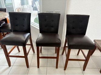 3 leatherette brown barstools