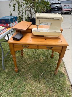 Antique Singer Sewing Machine in Maple Cabinet