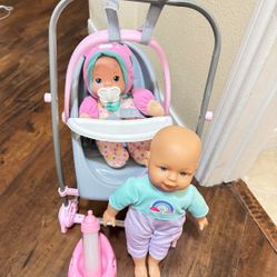 $5 - Baby Swing With Baby And Accessories