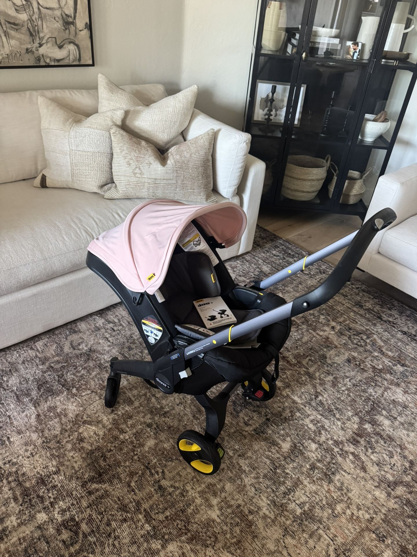 Pink Doona Convertible Stroller 
