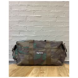 SUPREME DUFFLE BAG SS24 - WOODLAND CAMO