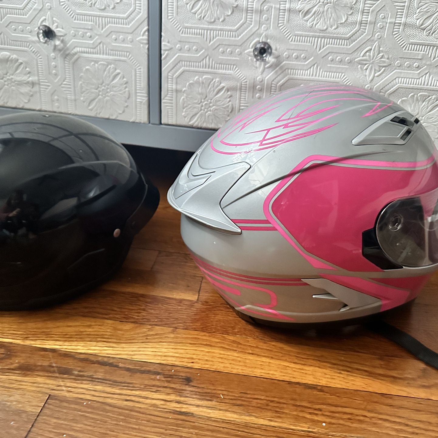 Two Motorcycle Helmets   