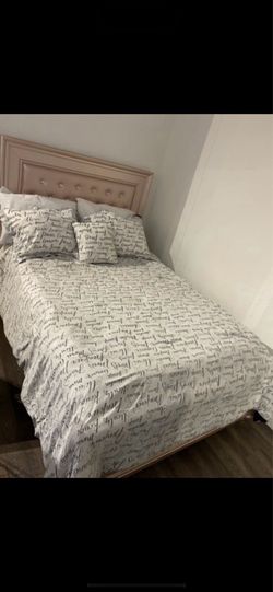 Full size bed with box spring still in plastic