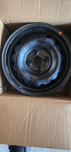 14 Inch Hyundai Rims With Covers.