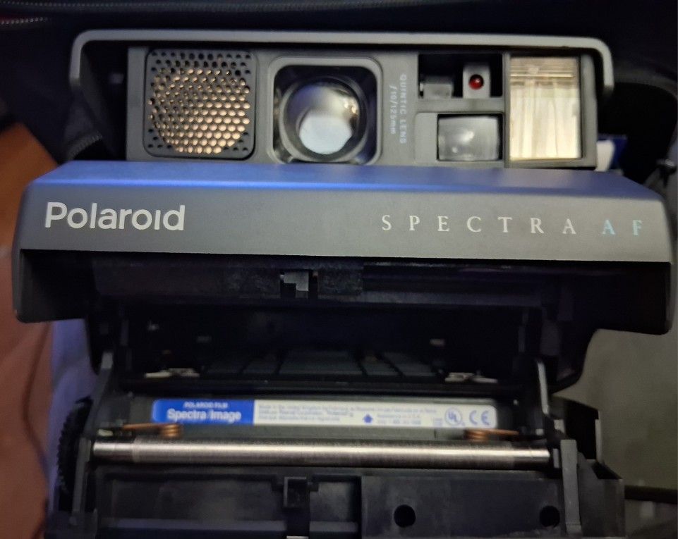 POLAROID  CAMERA W ACCESSORIES 