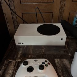 Xbox Series S White console with control. 