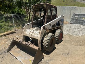 Bobcat skidsteer, excavator and breaker