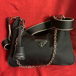 Original Prada re-edition 2 Way Crossbody microfiber handbag in good condition