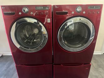 LG washer and dryer set with pedestals