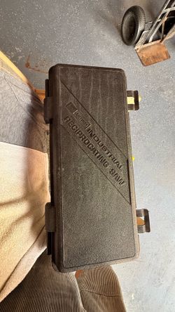 Reciprocating saw with case