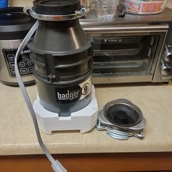 Used sinkerator  badger 9  3/4  HP  $50