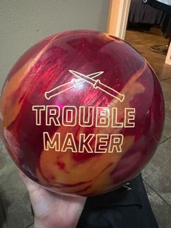 Trouble Maker Bowling Ball Red Gold Swirl