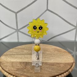 Sun Badge Reel