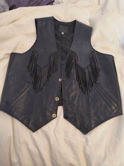 Clean medium leather vest and other vests and denim jackets