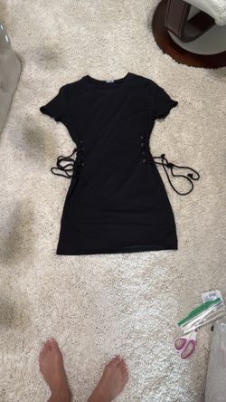 Elegant Black Lace-Up Dress shirt side tie sexy small says xs but not short sleeve. New no tags came in a bag. Ordered 2 on accident