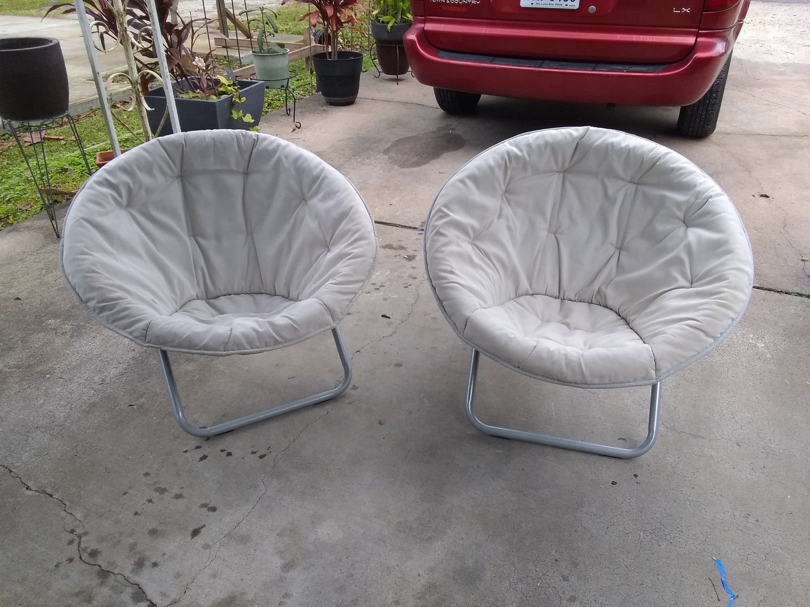 Two nice used outdoor foldable chairs.