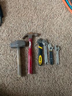 Adjustable wrenches