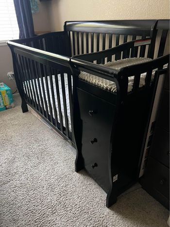 Baby crib with changing table and mattress included