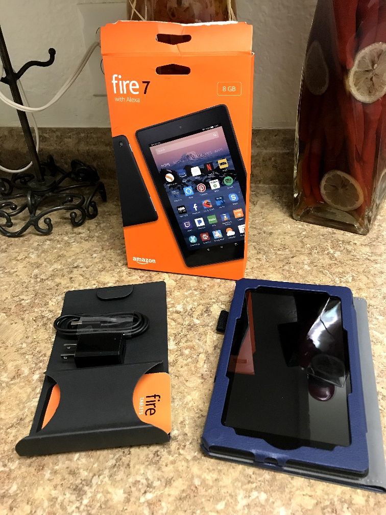 Fire 7 with alexa open box with accessories and case