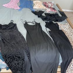 Assortment Of Women’s Dresses And Sweaters