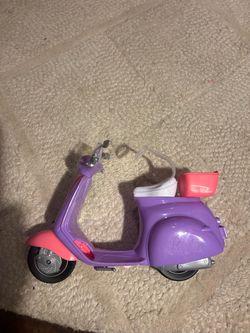 Barbie scooter and Barbie dolls