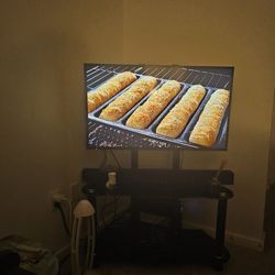 TV. And TV Stand 30 Inches /32 