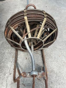 Snake drain cleaning machine
