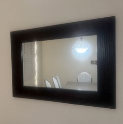 A large, heavy duty framed mirror O B O
