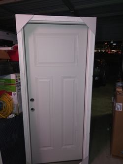 Therma tru 32in RH exterior door NEVER INSTALLED