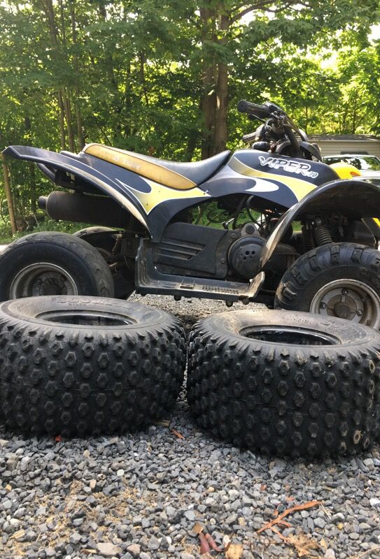 Black and yellow 70cc two stroke automatic eton viper ATV