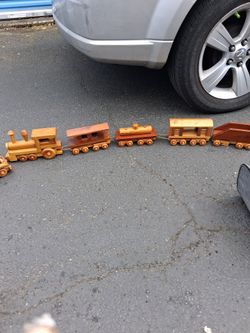 Handcarved train and truck set