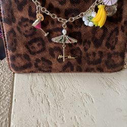 small brown animal print hang bag 