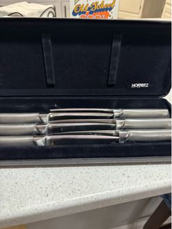 Set of six steak knives in case $10