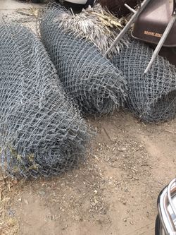 Three rolls of heavy duty chain link