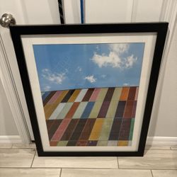 Multiple Pictures With Hard Wood Frames