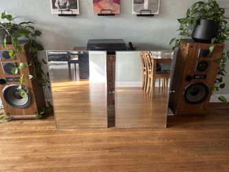 Two mid-century modern beveled mirrors. 24x36