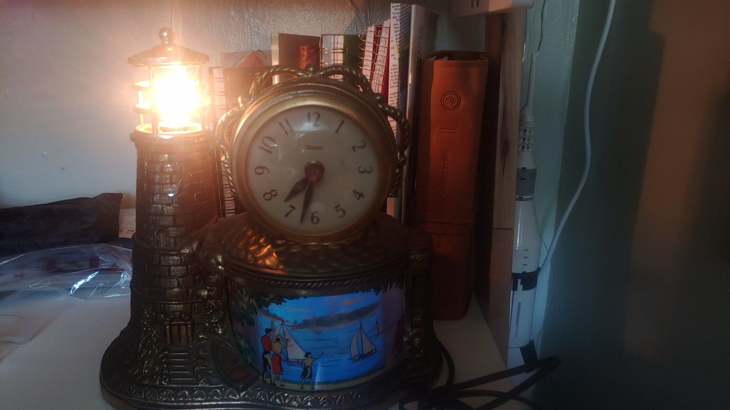 Vintage 1950's United Clock Corp. Lighthouse Nautical Motion Clock
