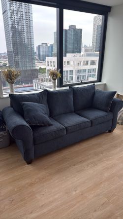 New couch - barely used. Navy blue