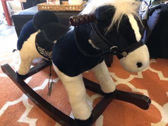 Beautiful stuffed rocking horse.. please serious buyers and no low ball offers