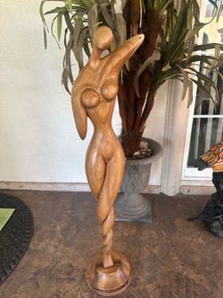 Woman wood carving statue sculpture
