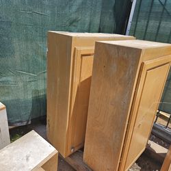 Free 5 upper kitchen cabinets used fair condition for maybe a garage or shed 4 storage, free ,you pickup 