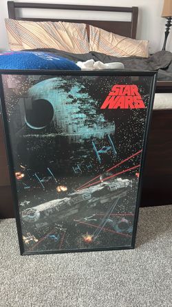 Star Wars poster in frame
