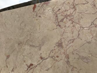 Marble 1/2” thickness slabs crème with red veins
