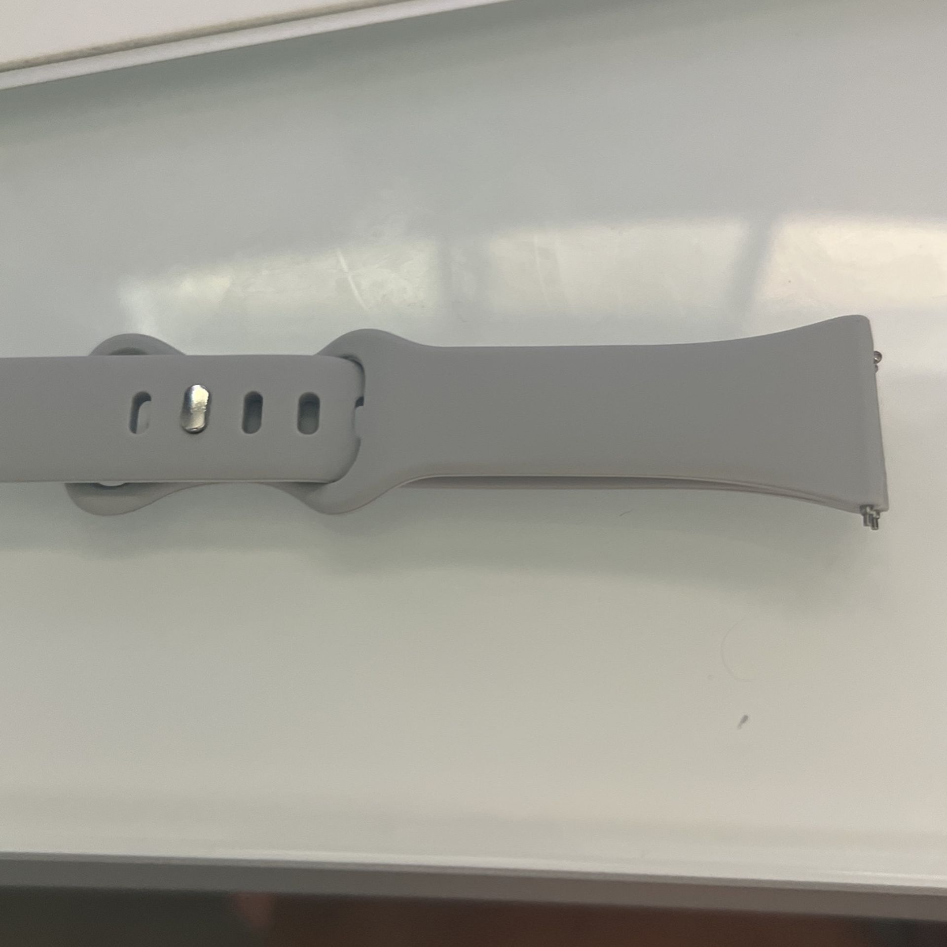 Gray Fitbit Versa Band