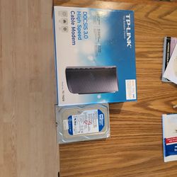Tp LINK CABLE MODEM. 250 GIG HD 12 Both