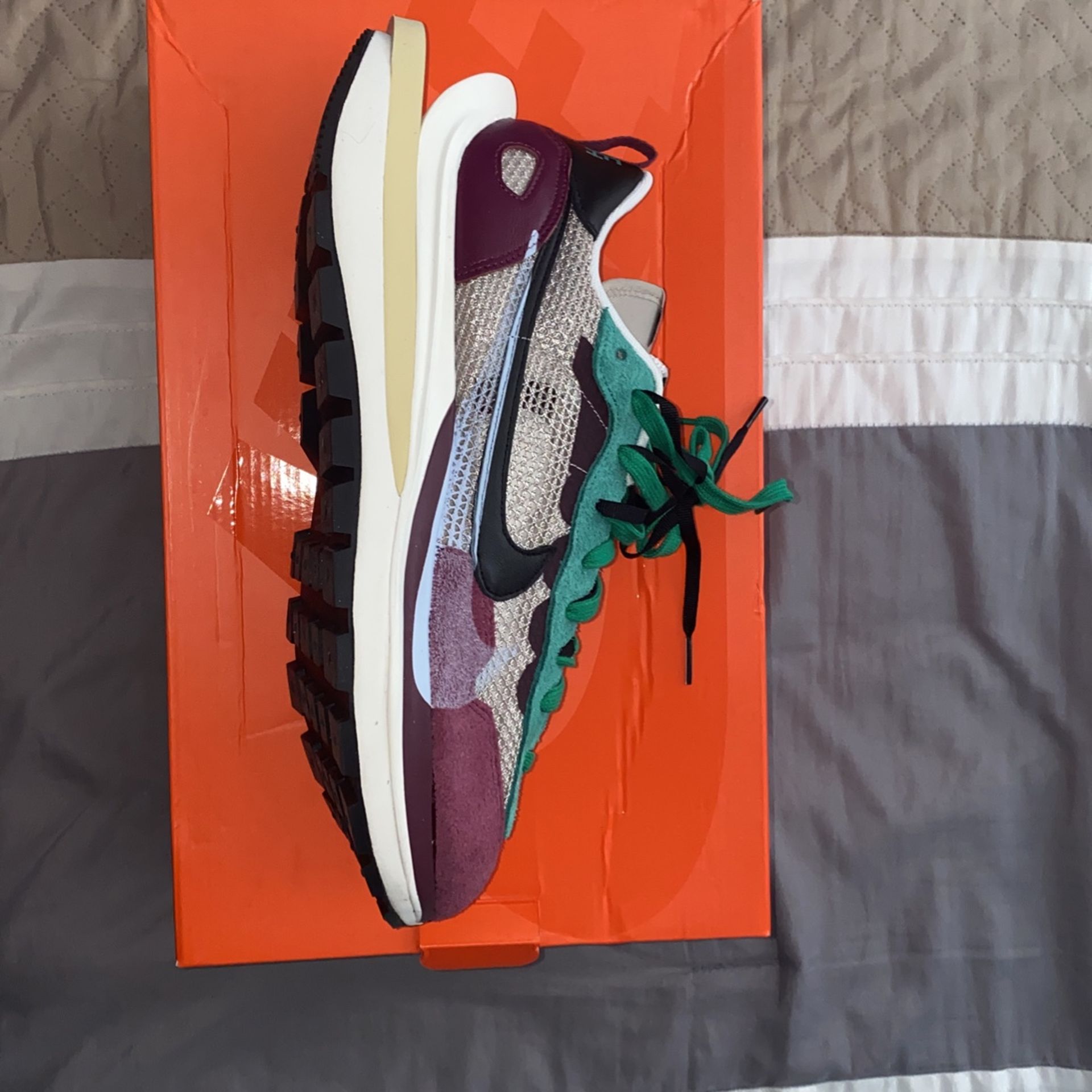 sacai nike villain red