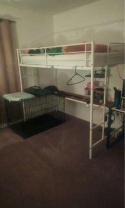 Twin bunk bed with desk