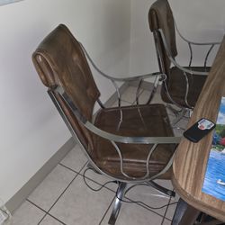 Mcm Swivel Leather And Chrome Chairs