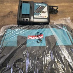 Makita Fast Charger And Bag. 